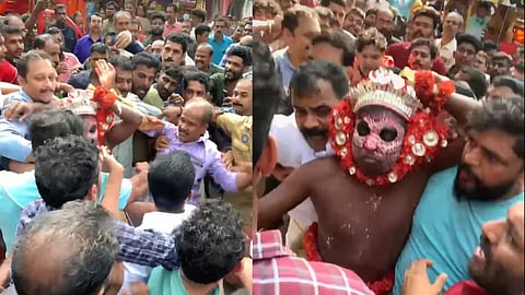 തെയ്യം കെട്ടിയ ആളെ നാട്ടുകാര് ആക്രമിക്കുന്നു