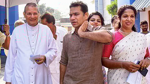 Hibi Eden and wife Anna Eden arrives to cast their votes for the second phase of Lok Sabha elections