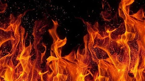 The woman and her son died after her husband set her on fire