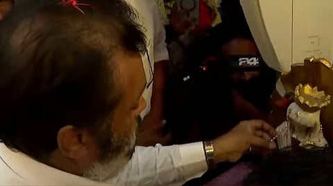 suresh gopi receives gold rosary at lourdes church