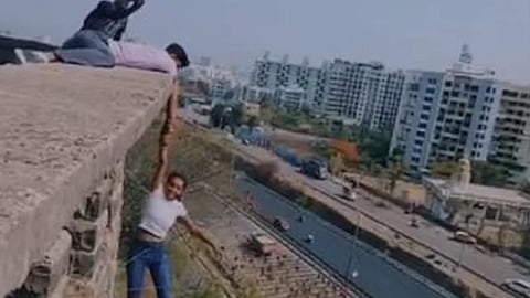 Pune Woman Hangs From Building Holding Man's Hand
