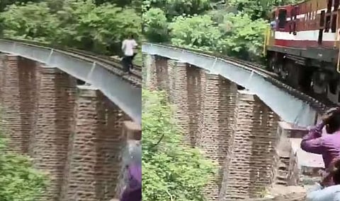 Newlywed couple jumped down during a photoshoot on the railway bridge