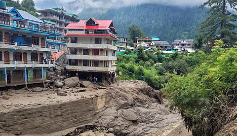 Footbridge, makeshift sheds washed away in flash flood in Kullu .