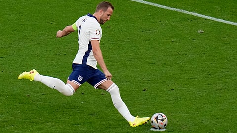 Harry Kane aims trophy