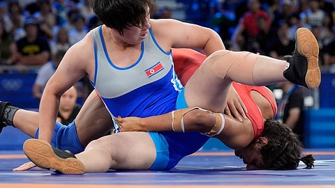 Injured Nisha Dahiya loses