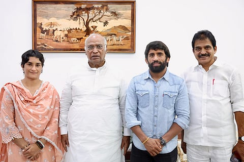 Vinesh Phogat and Bajrang Punia with congress leaders