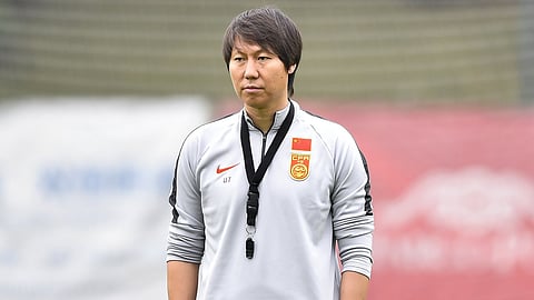 Former China football coach jailed