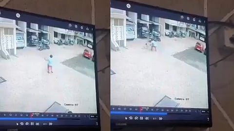 താഴേയ്ക്ക് വീഴുന്ന കുട്ടിയുടെ അടുത്തേയ്ക്ക് ഓടിയെത്തുന്ന യുവാവ്