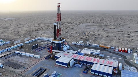 China's oil firm drills Asia's deepest vertical well .