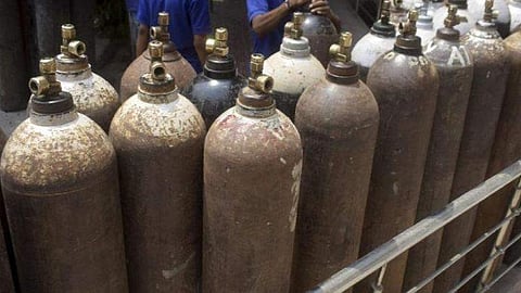 oxygen cylinder explosion; nurse injured