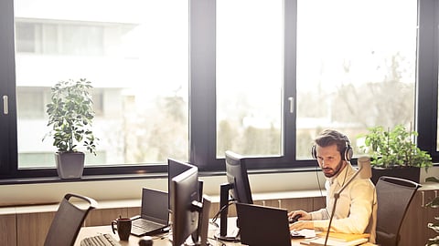 a man sitting in a office