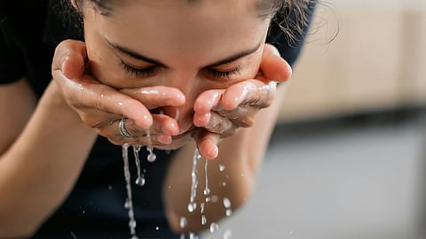 washing face with cold water
