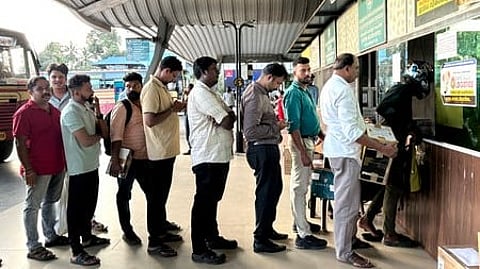 People waiting infront of the KSRTC courier service at Vytila hub in Kochi