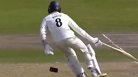 Lancashire cricketer accidentally drops mobile phone while running between wickets