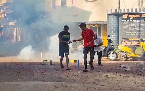 People burst firecrackers as they hail 'Operation Sindoor'