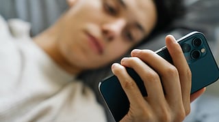 using mobile phone in bed