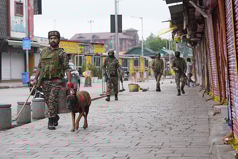 Security personnel with sniffer dog keep vigil amid prevailing India-Pak tensions