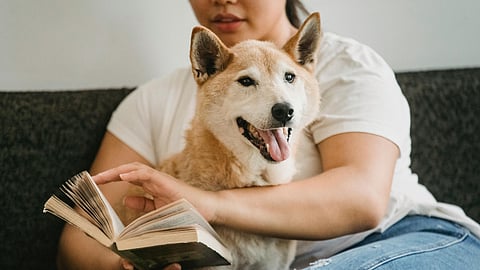 WOMAN WITH PET