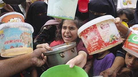 Siege ends, food begins to reach Gaza; 100 trucks allowed