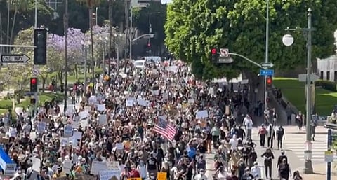 Protesters clash with National Guard troops in Los Angeles -
