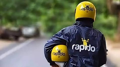 Rapido bike driver with helmet