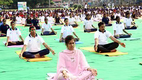 people practicing yoga