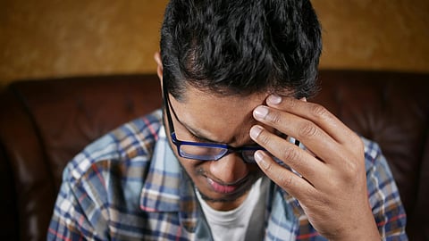 man with headache