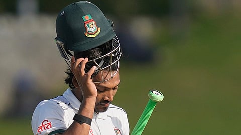 Bangladesh's captain Najmul Hossain Shanto leaves the ground after losing his wicket
