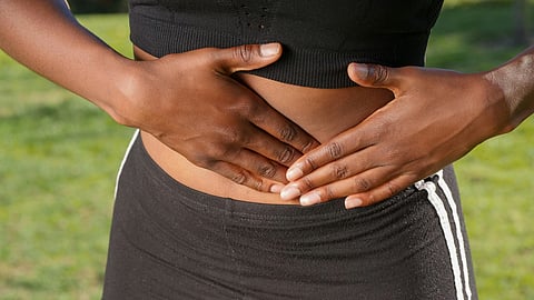 A women touching stomach
