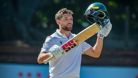 Wiaan Mulder celebrates after scoring a double century