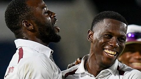 Shamar Joseph celebrates wicket with his teammate
