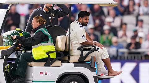 Rishabh Pant grimaces in pain as he is being taken off field after an injury