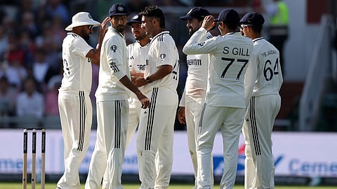 Anshul Kamboj is congratulated by his teammates for taking the wicket of Ben Duckett