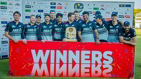 New Zealand team with the T20 Tri-Nation Series trophy