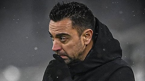 Xavi Hernandez in the dugout