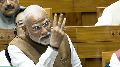 Prime Minister Narendra Modi speaks during a debate in the Lok Sabha on the Pahalgam terror attack and Operation Sindoor