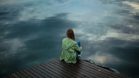 Woman sitting alone