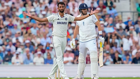Prasidh Krishna celebrates after taking the wicket of England's Jamie Overton