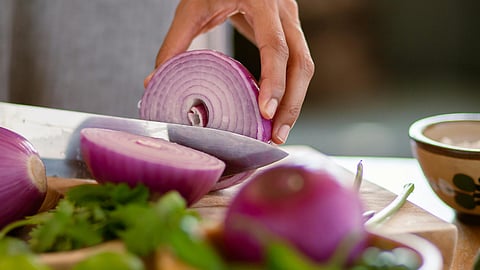 someone cutting onion
