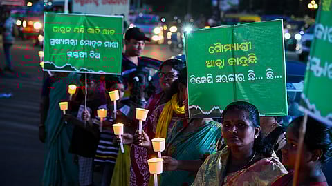 protest demanding justice for FM Autonomous College self-immolation victim in Odisha