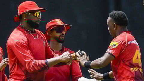 Pollard, Pooran and Bravo during training