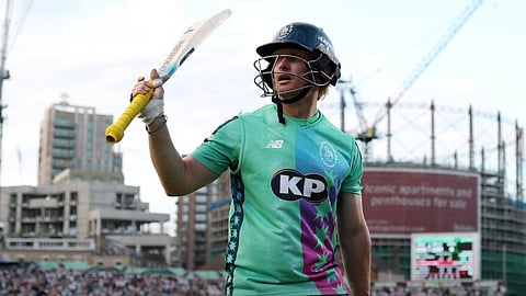 Jordan Cox celebrates his half-century