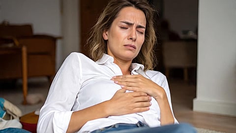 Woman having chest pain