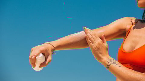 woman wearing sunscreen