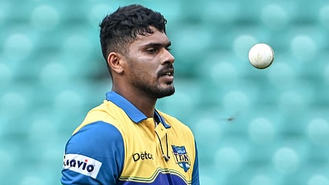 Sibin Girish while bowling