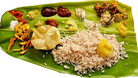 Food poisoning from Onam feast; over 50 students hospitalized.