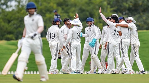 Central Zone's Akshay Wadkar with teammates celebrate after the run out of South Zone's Tanmay Agarwal