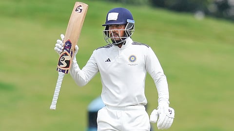 Yash Rathod celebrates after scoring 150 runs