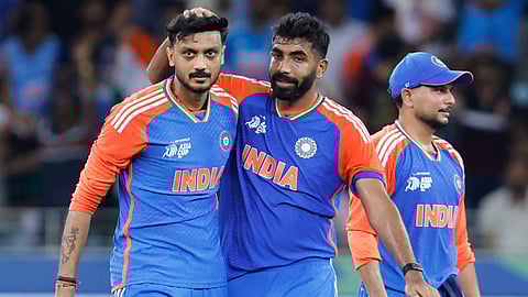 Bumrah congratulates Akshar for taking a wicket