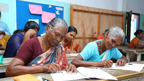 literacy mission Kerala.